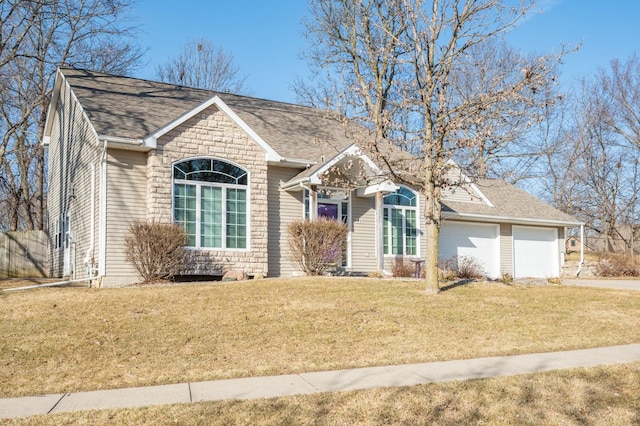 single story home with a front yard, a garage, and roof with shingles