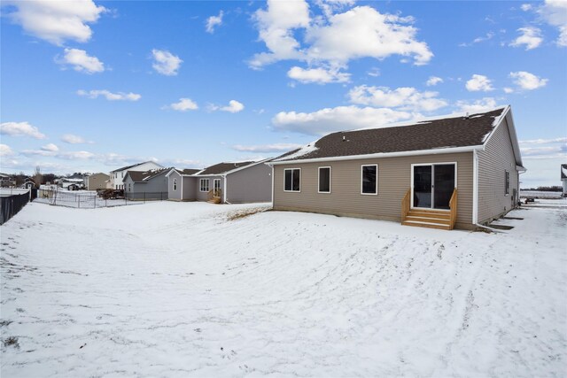 view of snow covered house