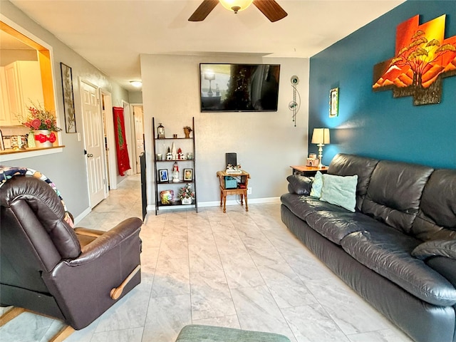 living room with ceiling fan