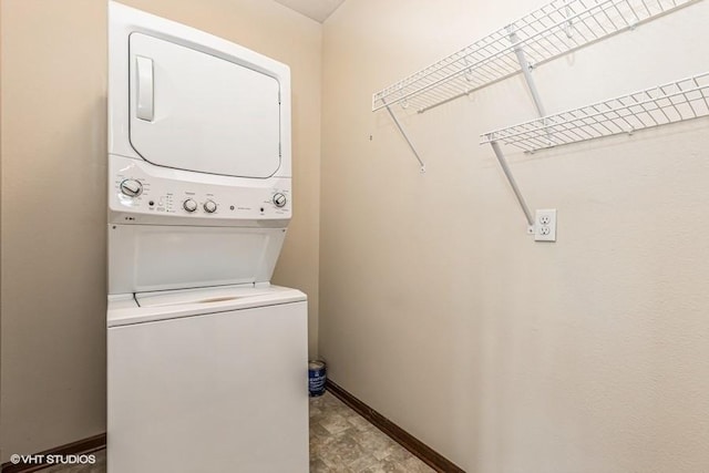 laundry room featuring stacked washing maching and dryer