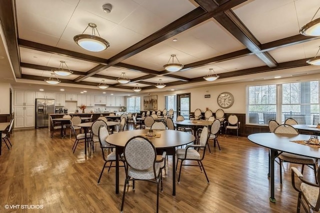 dining room featuring beamed ceiling, dark hardwood / wood-style floors, and coffered ceiling