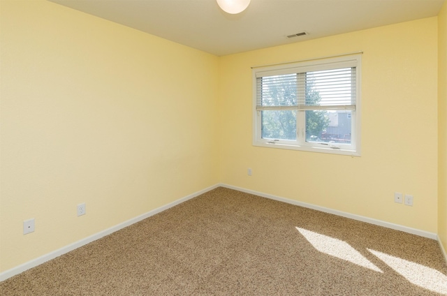 unfurnished room with carpet