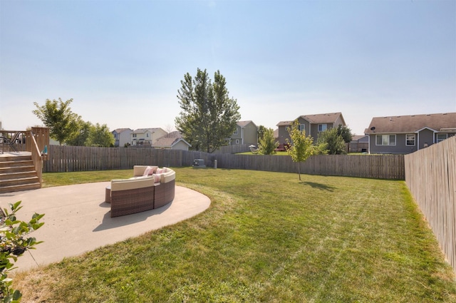 view of yard featuring an outdoor living space and a patio area