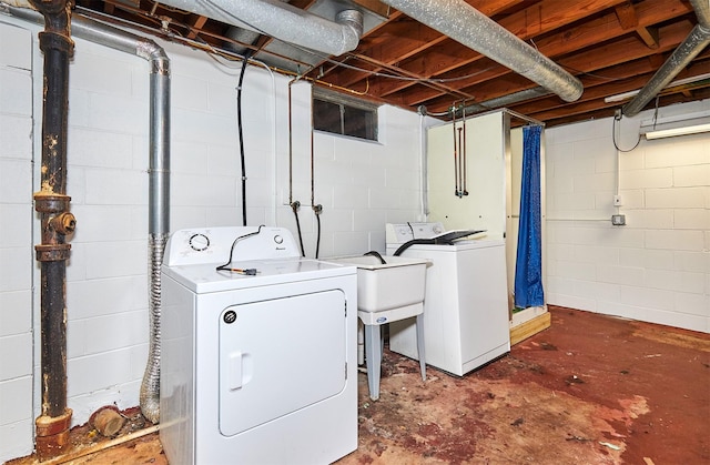 washroom with washing machine and dryer