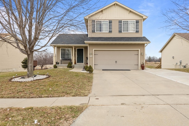 view of front property with a front yard and a garage