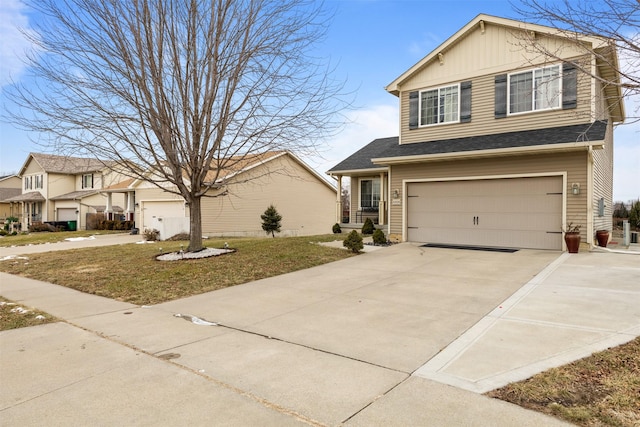 view of front of house with a front lawn and a garage