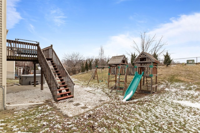 snow covered playground with a hot tub