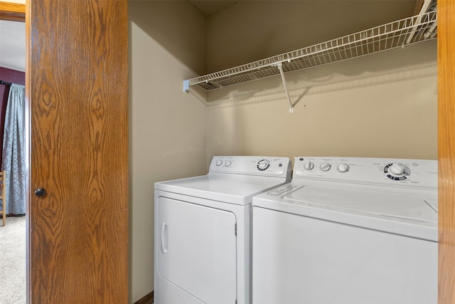 laundry area featuring washing machine and dryer