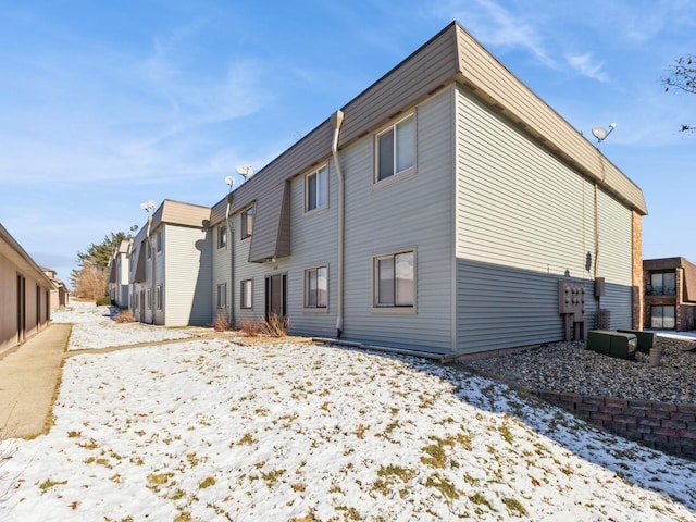 view of snow covered property