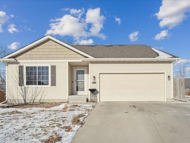 ranch-style home featuring a garage