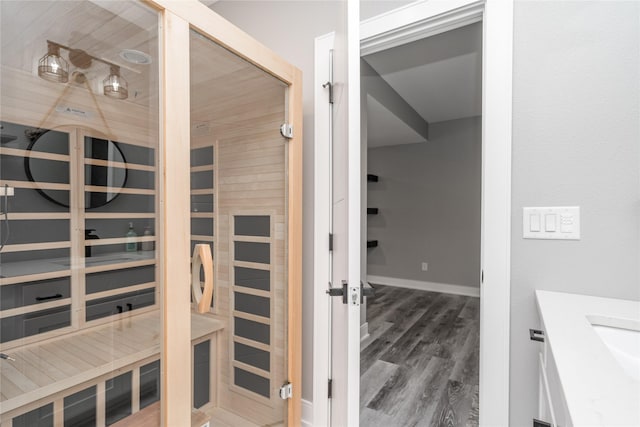 view of sauna / steam room featuring wood-type flooring