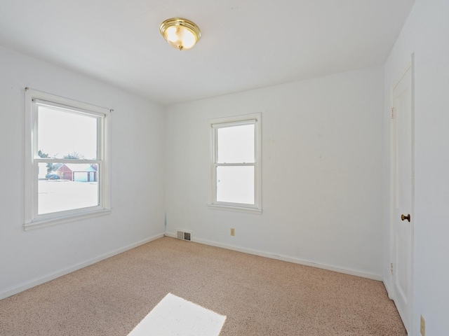 view of carpeted spare room