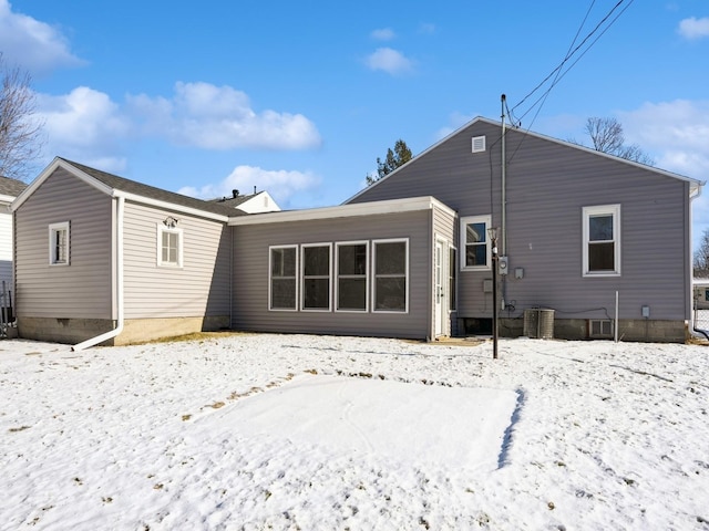 view of snow covered house