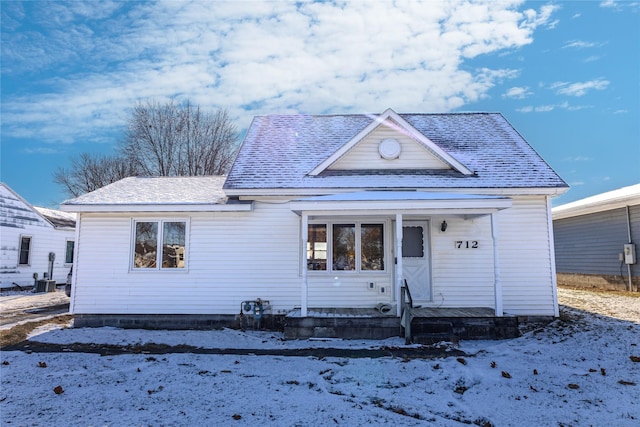 bungalow-style home featuring central AC unit