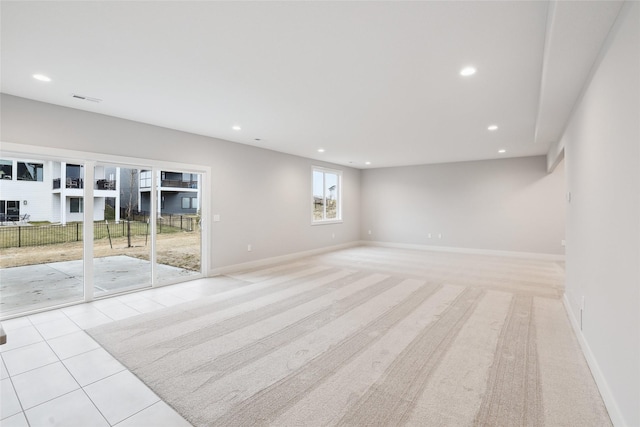 empty room with light tile patterned flooring