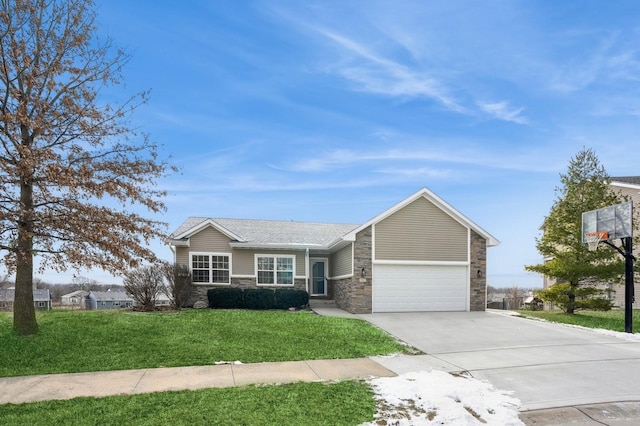 view of front of home with a garage and a front yard