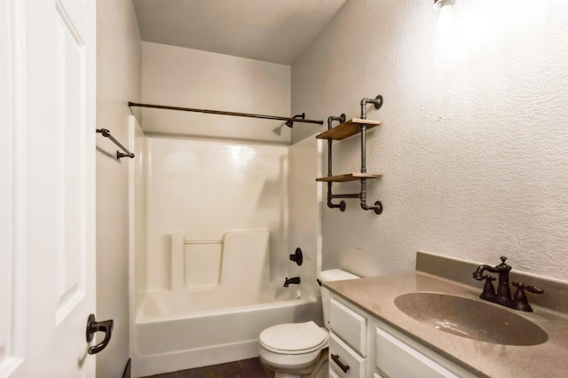 full bathroom featuring vanity, shower / bathing tub combination, and toilet