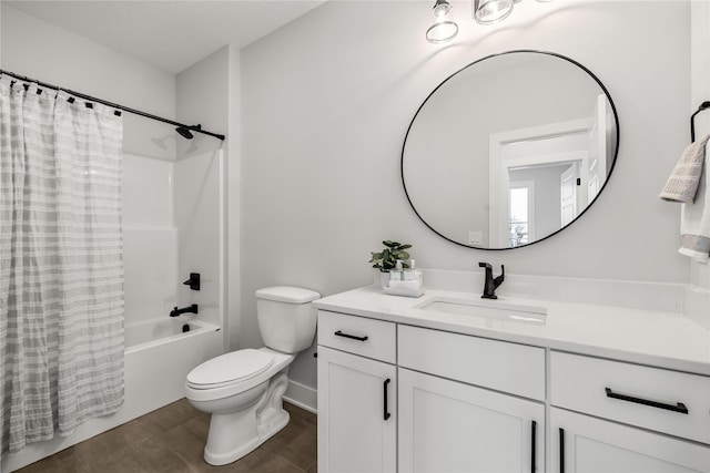 full bathroom featuring vanity, toilet, and shower / tub combo