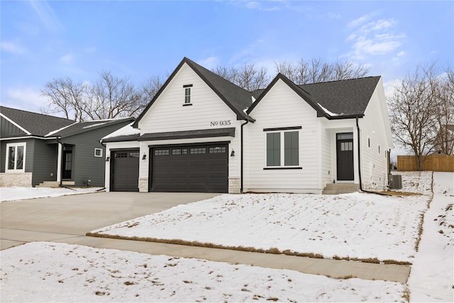 modern farmhouse style home with a garage and central AC