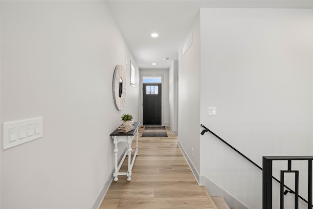 hallway featuring light hardwood / wood-style flooring