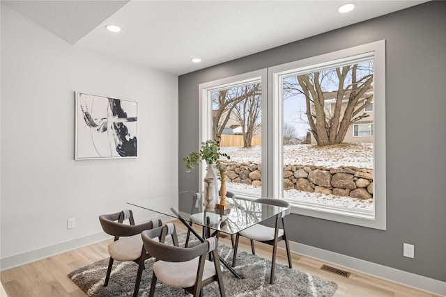 interior space with light hardwood / wood-style floors and a textured ceiling