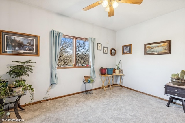 misc room with ceiling fan and light colored carpet