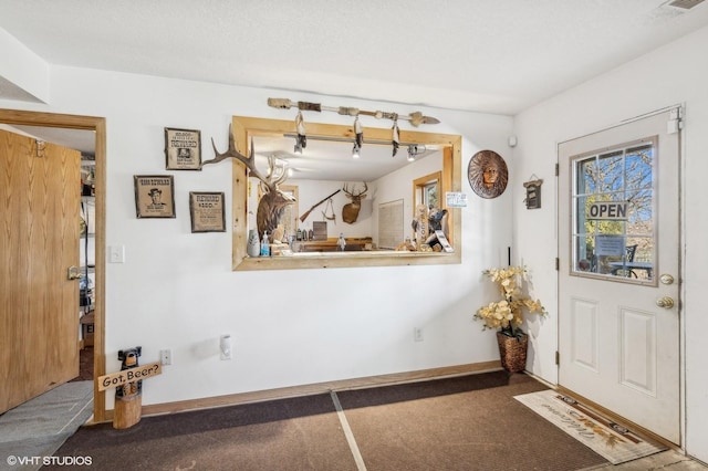 view of carpeted entryway