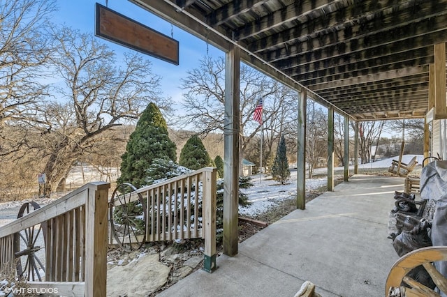 view of snow covered patio