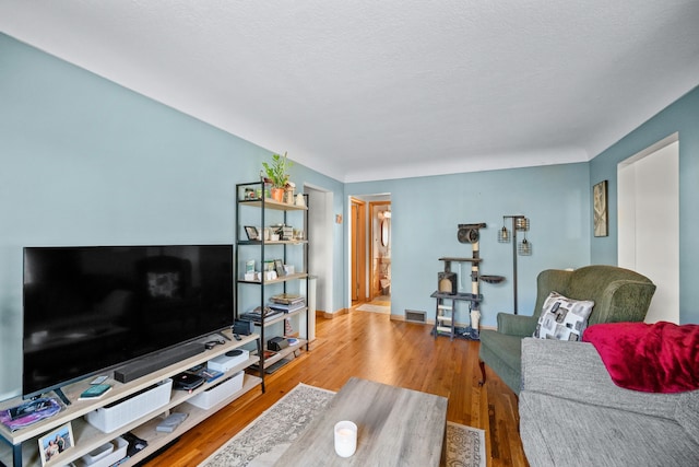 living room with hardwood / wood-style flooring