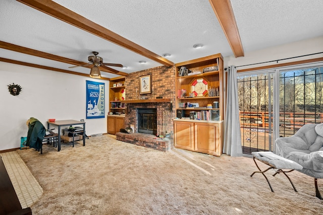 living room with a fireplace, beam ceiling, carpet floors, and a textured ceiling