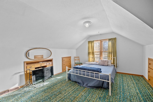 carpeted bedroom with lofted ceiling and a textured ceiling