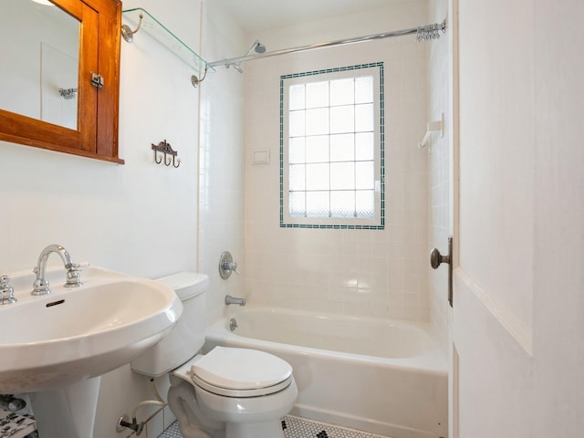 full bathroom with sink, shower / bath combination, and toilet