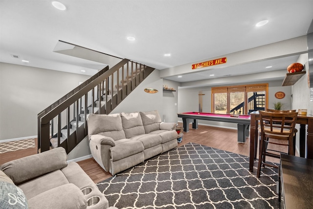 living room with billiards, stairway, wood finished floors, and baseboards