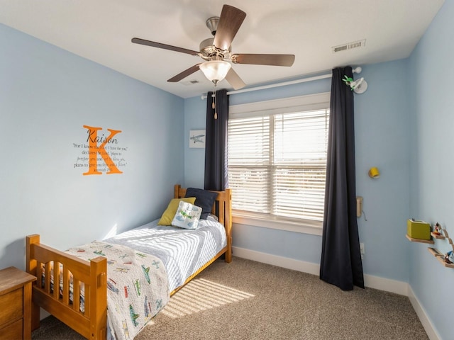 carpeted bedroom featuring ceiling fan