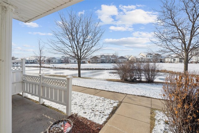 view of snow covered patio