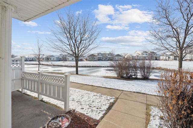 view of snow covered patio