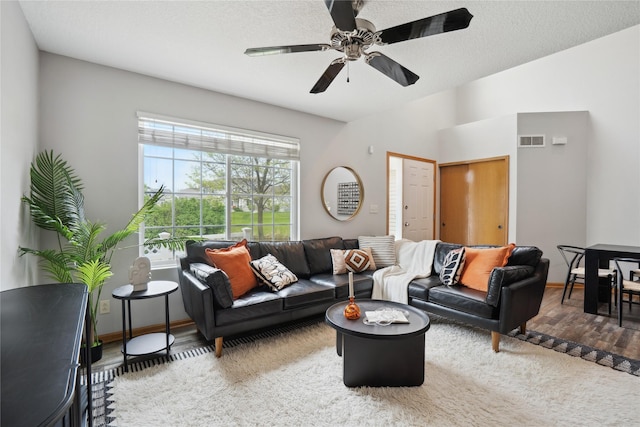756 SE Williams Ct, Waukee, IA 50263 - living area featuring ceiling fan and baseboards