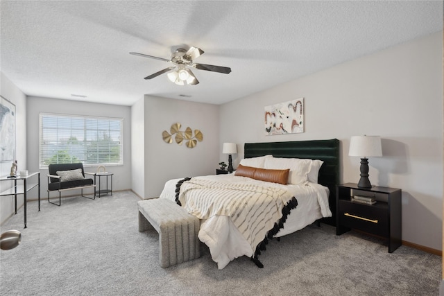 756 SE Williams Ct, Waukee, IA 50263 - bedroom with carpet, a textured ceiling, and ceiling fan