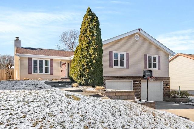 view of front of property featuring a garage