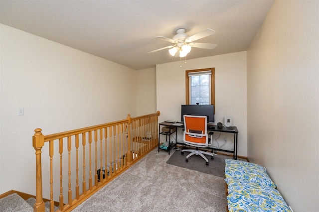 office featuring light carpet and ceiling fan