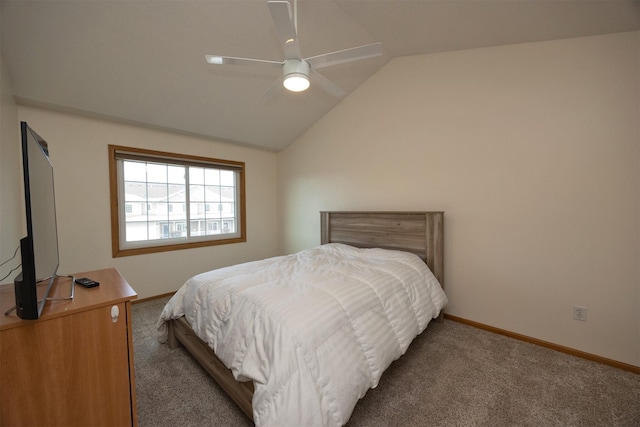 bedroom featuring vaulted ceiling, carpet flooring, and ceiling fan