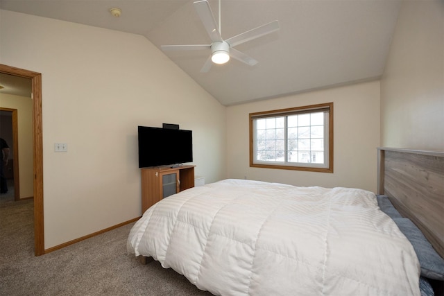 carpeted bedroom featuring vaulted ceiling and ceiling fan