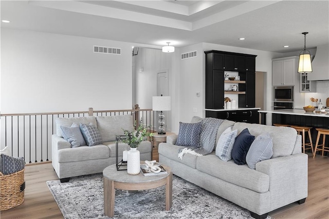 living room featuring light wood-type flooring