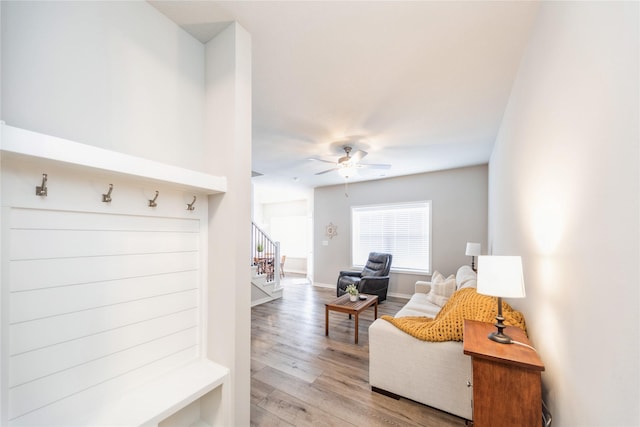 mudroom with light hardwood / wood-style flooring and ceiling fan