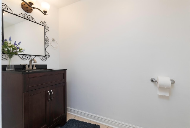 bathroom featuring tile patterned floors and vanity