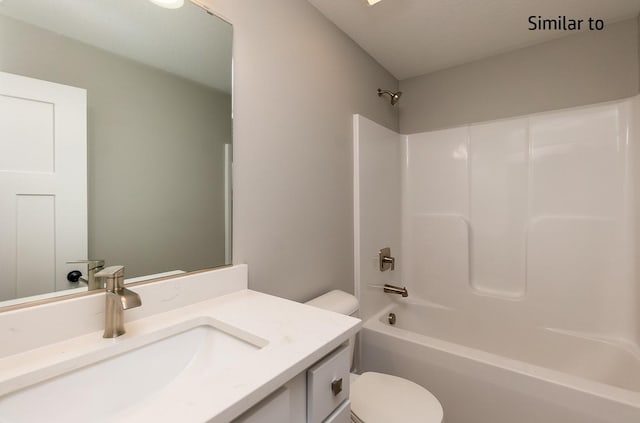 full bathroom featuring shower / bathing tub combination, vanity, and toilet