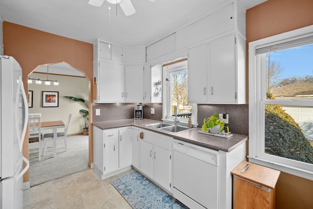 kitchen with white cabinets, ceiling fan, white appliances, and sink