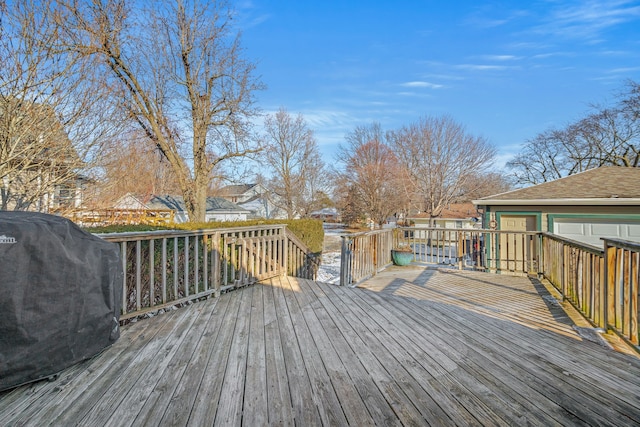 wooden terrace with grilling area