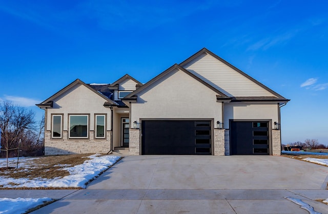 view of front of property with a garage