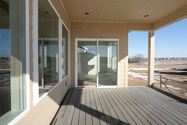 view of snow covered deck